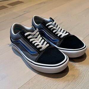 Men's 7 - Women’s 8.5 Black, White and Blue Vans Sneakers